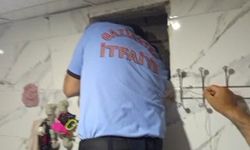 Havalandırma boşluğunda mahsur kalan güvercini itfaiye kurtardı